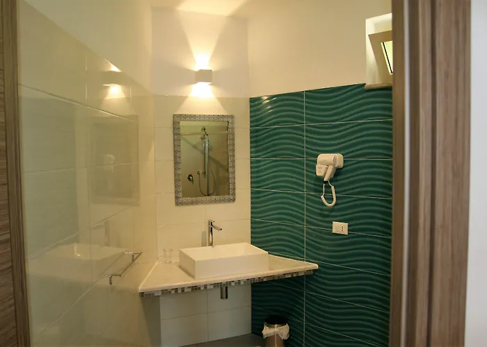 מלון דירות Pietre Bianche 4*